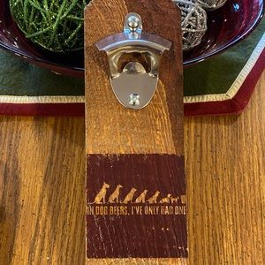 In Dog Beers Bottle opener. Key hole slot for mounting and a 1” magnetic catch.